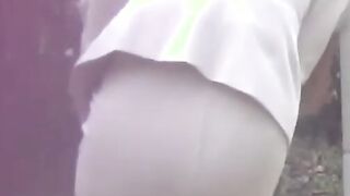 Classy Japanese redhead finds a secret place to pee