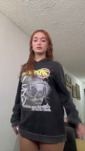 Red hair girl in black hoodie