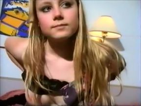 Shy blonde teen shows her pussy in a hotel room