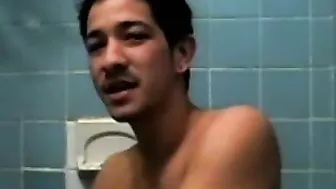 Tattooed twink showers and strokes his big cock