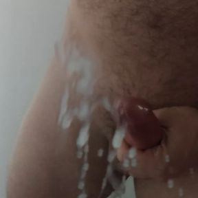 Juicy cumshot on mirror