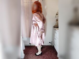 Redhead crossdresser Nottstvslut in vintage satin.