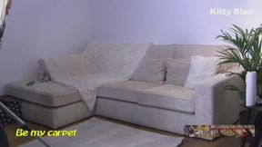 Kitty Blair vacuuming first time her new living room close can