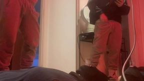 amateur boy pissing in a glass held in his friend s mouth