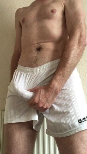 wanking in adidas footy shorts