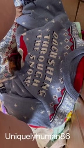 Laundry day - peeing on my Christmas sweater!