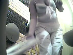 Chubby pale skin mature white woman in the public toilet room