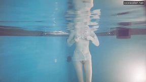 Sasha strips bare in the water