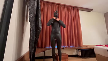 Preparations for an evening dressed in latex