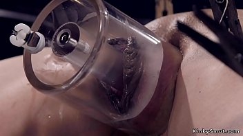 Brunette slave takes whipping, device bondage, and fucking in the dungeon