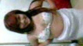 Filipina masseuse flashes her tits on my cam