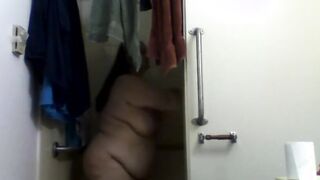 woman taking shower