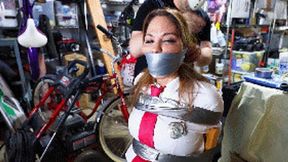 Massive wraparound tape gag to keep loud detective Anna Lee shut!