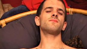 Tattooed Jesse is happy to jack off wherever and whenever he pleases. Lucky for us, we're there for the show. He tugs at his hardening cock, while sitting in a chair, before he stands up and defies gravity for a while.