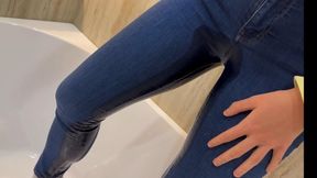 Pee in skinny jeans and wet playing with pussy!