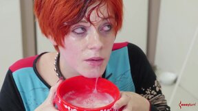 Flogged BDSM submissive drinks lube
