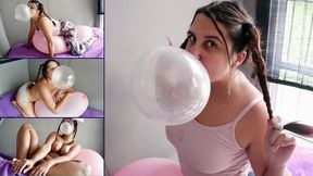 Braided Pigtails girl makes bubbles on big balloon - Bunny Looner