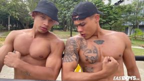 2 warm latino men demonstrate their muscles