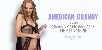 American Granny shows off her lingerie and shaved granny pussy!