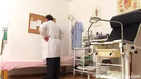 Sexy granny gets checked out by doctor, her massive booty on display for all to see.