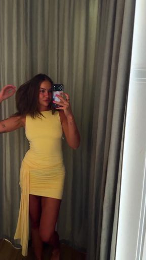 Curvy blonde in yellow dress