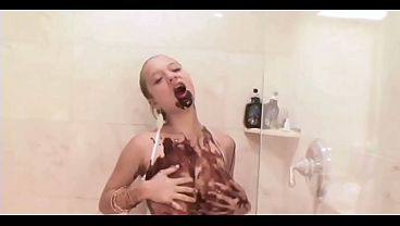 Busty latina teen covered in chocolate sauce