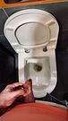 Hairy guy with an uncut cock urinated in a public toilet at a gas station. Gay pissing porn
