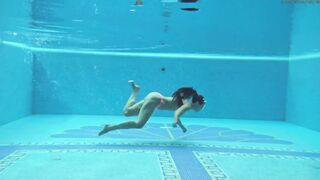Hungarian nude Sazan Cheharda swimming posing