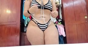 Voluptuous maid slowly undresses