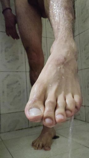 My feet in the shower rain