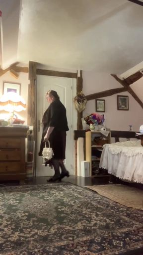 In an outfit with a little pleated dress for an evening