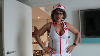 Nurse comes to see patient in his room