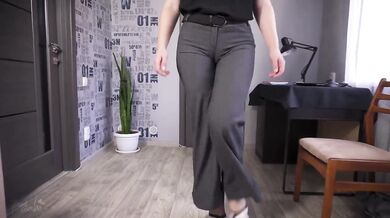 Her tight trousers can barely contain that perfect secretary ass