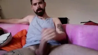 Bearded tattooed hunk jerks off and cums on webcam