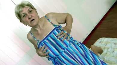 European granny with sagging breasts enjoys cum in her mouth from a young man