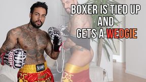 Boxer is tied up and gets a wedgie - Lalo Cortez