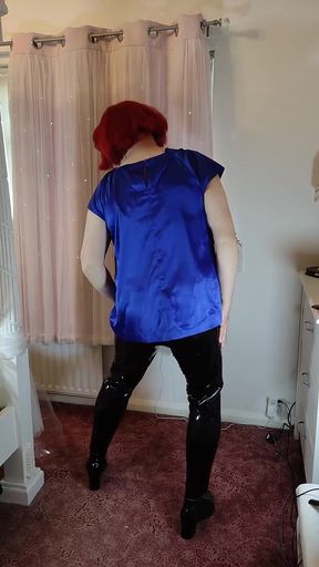 Hot crossdresser in satin blouse and pvc leggings