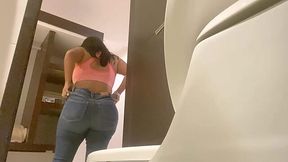 Latina Babe Caught on Cam Taking a Leak in Public Bathroom