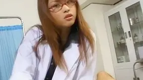 Nerdy nurse Akira Shiratori performing a cum sucking surgery