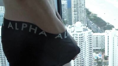 Window Aussie Surfer Exhibitionist Gets Naked and Shoots His Cum load Over the Gold Coast Beach