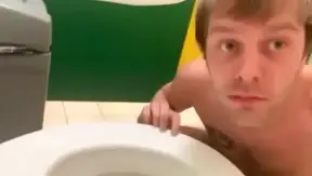 Public Bathroom Humiliation – Naked Fag Gets Rough Toilet Action