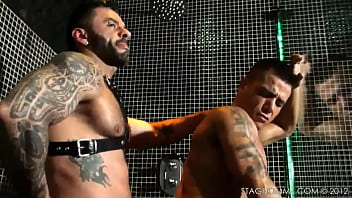 StagHomme - Inked muscle studs fuck in fetish gear inside steamroom