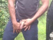 Hauls out cock and balls, pisses on the ground, in rubber boots and uniform