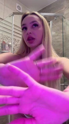 Cute teen with a big dick shows off her tits and ass