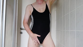 Swimsuit pose and strip