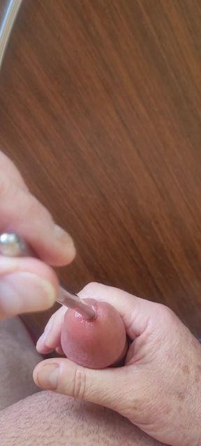 Masturbating my smooth cock with sounding rods before cumming