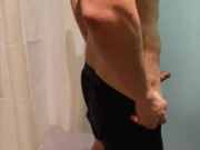 cam in gym shower shows hunk giving himself a golden shower and cum