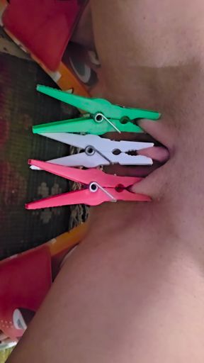 Ana Liz tortures and stretches her tight pussy with tweezers in close-up...