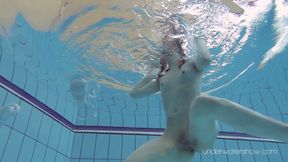 Flawless European teen Roxolana takes her bikini off underwater