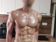 6'7" oiled muscular stud flexing and stroking his BWC